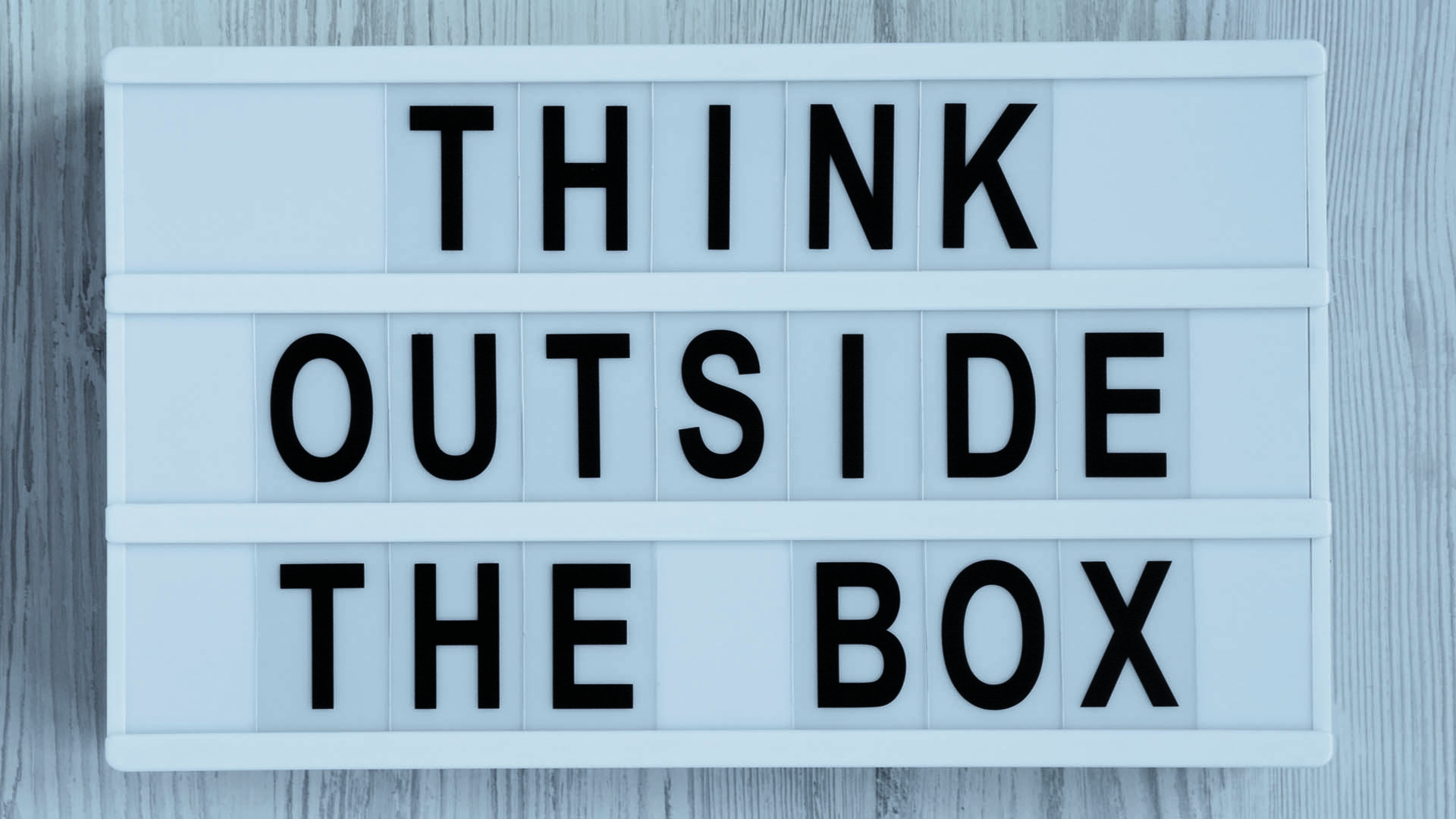 A white sign with black text